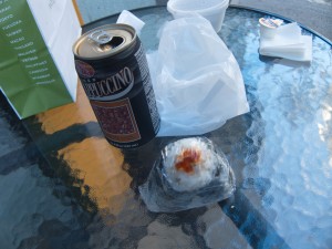 Canned coffee and musubi