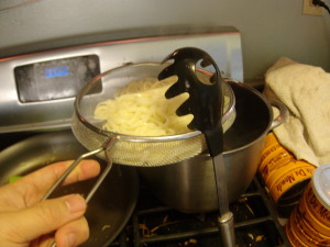 Straining the noodles